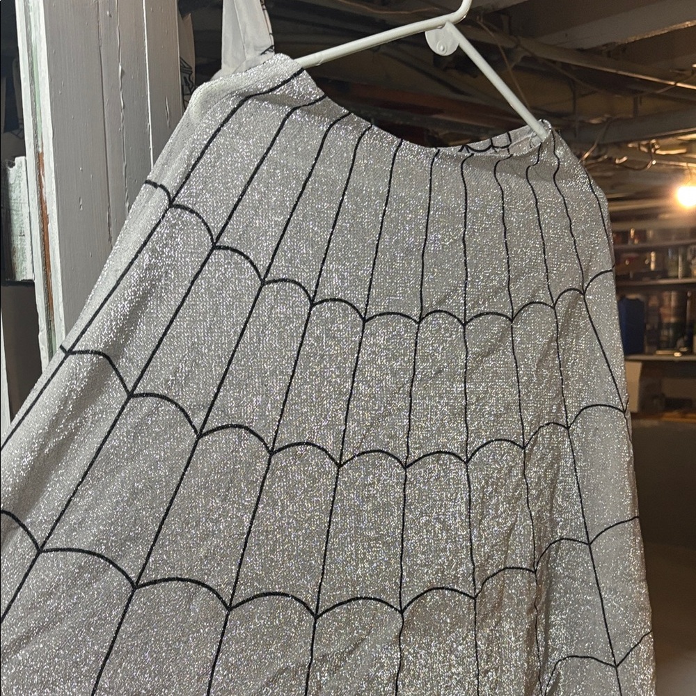 Silver Spider Web Patterned cape/poncho.